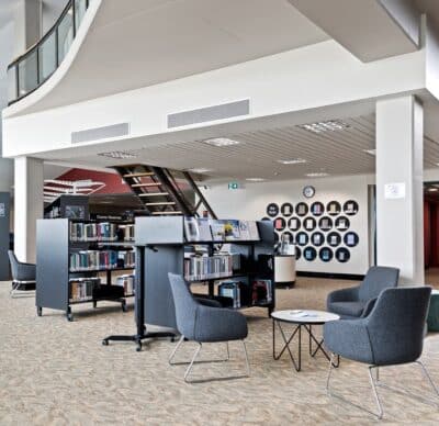 Reading zone featuring Iris chairs and Soho table